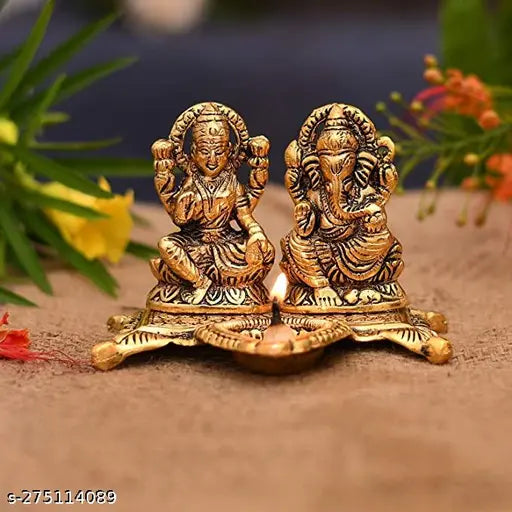 Golden brass Ganesh and Laxmi idols, traditional Indian diya for puja, home decor, office gift