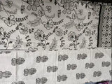 White embroidered AC patterned quilted dohar with white border