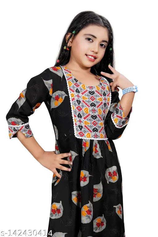 Unique embroidery designer girls kurta set in cotton, straight top with three-quarter sleeves and trousers bottom, size 8-9 years. Indian kid's outfit from contemporary brand Nivudi