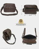 Black leather crossbody bag with shoulder strap, multiple compartments and pockets