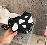 Black and white polka dot crossbody bag