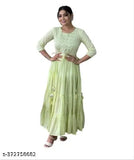 Green rayon anarkali gown with embroidery, printed for special occasions in India