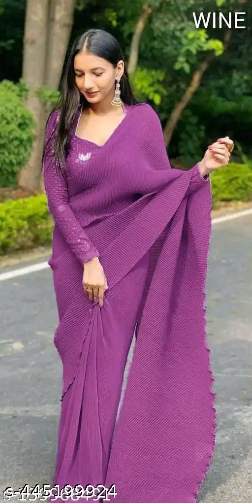 Purple saree, draped elegantly