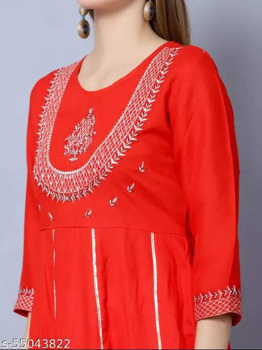 Embroidered rayon kurti, three-quarter sleeves, printed combo. Indian women's fashion, embroidered detailing on display