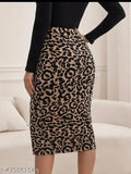 Printed leopard-pattern polyester bodycon midi skirt with side slit and elastic waistband. Available in XS, S, M, L. Made in India