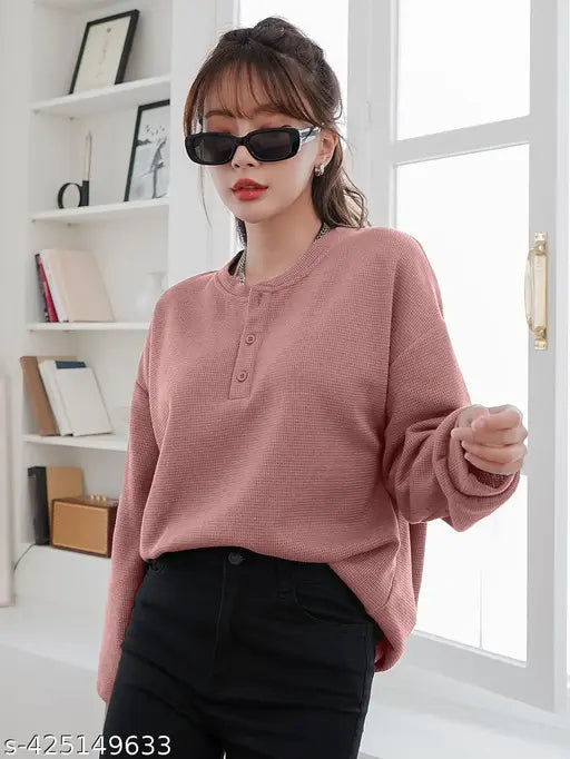 Oversized long sleeve round neck top in casual style, suitable for winter or western fashion