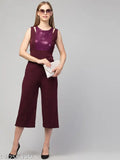 Women's wine red solid pleated cotton blend jumpsuit, sleeveless and party-ready style on display