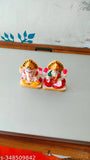 Handcrafted marble Ganesha idol in vibrant colors, intricate designs, 15cm x 9cm