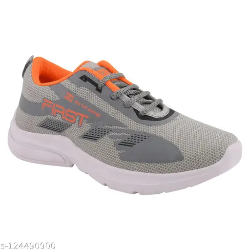 Gray and orange lace-up sports shoes, likely for running or training, with a white sole, suitable for kids participating in a race event