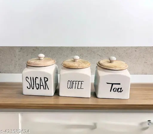 Three ceramic kitchen tea coffee sugar canisters with airtight lids
