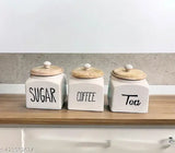 Three ceramic kitchen tea coffee sugar canisters with airtight lids