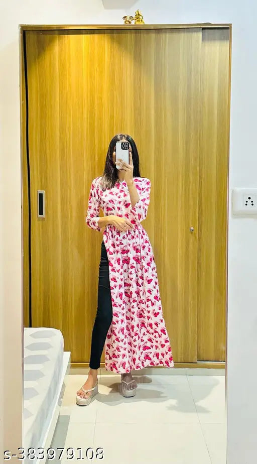 Red floral print kameez with three-quarter length sleeves, knee-length skirt, and matching dupatta