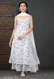 A woman's white sleeveless kurta with a palazzo cut and striped shoulder dupatta