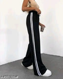 Fashionable woman in high waist striped pants