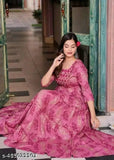 Rayon printed gown, vibrant Indian rayon dress with three-quarter sleeves and intricate pattern on display