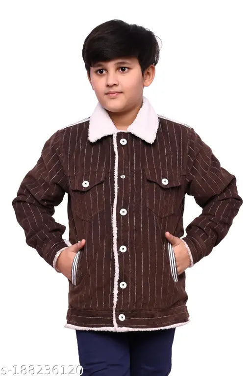 A young boy posing in a brown and white fur trim jacket