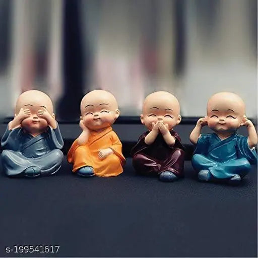Miniature baby monk statues in polyresin, handcrafted with smiles on faces; set of 4 for decor, showpiece, or gift