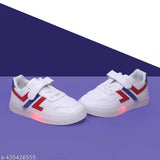 White shoe with blue and red accents, lit LED soles