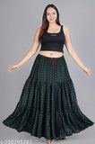 Green printed rayon long skirt for women, featuring intricate design on net fabric. Available sizes: 34/18in, 36/19in, 38/19in, 40/20in, 42/21in, 44/22in, 46/23in, 48/24in, Free Size/25in (Made in India)