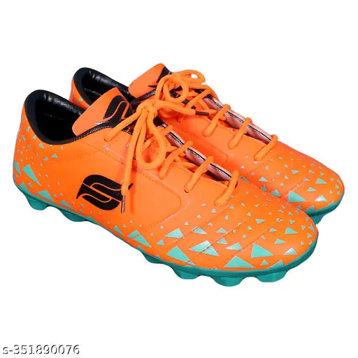Orange PVC football shoes for boys - lightweight, water-resistant with EVA sole and printed net pattern, designed for ground and turf play with improved balance and comfort