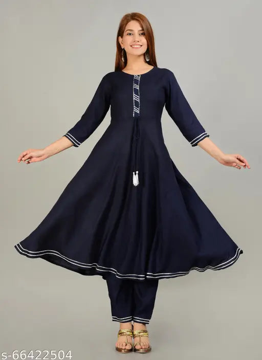 Rayon ANarkali Kurti set with palazzos, three-quarter sleeves, self-design net pattern. India origin