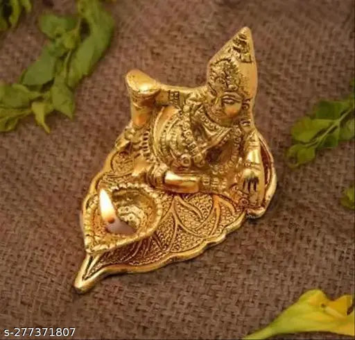 Metal Kubera Deepam temple decor, Indian handicraft with a length of 11cm, height of 9cm, and breadth of 7cm