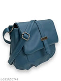 Blue, faux leather sling bag with shoulder strap and zip closure