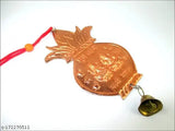 Metal Hindu God Ganesha, Lakshmi Subh & Labh on Kalash with hanging bell - intricately designed Indian festival decoration for spiritual beauty and prosperity