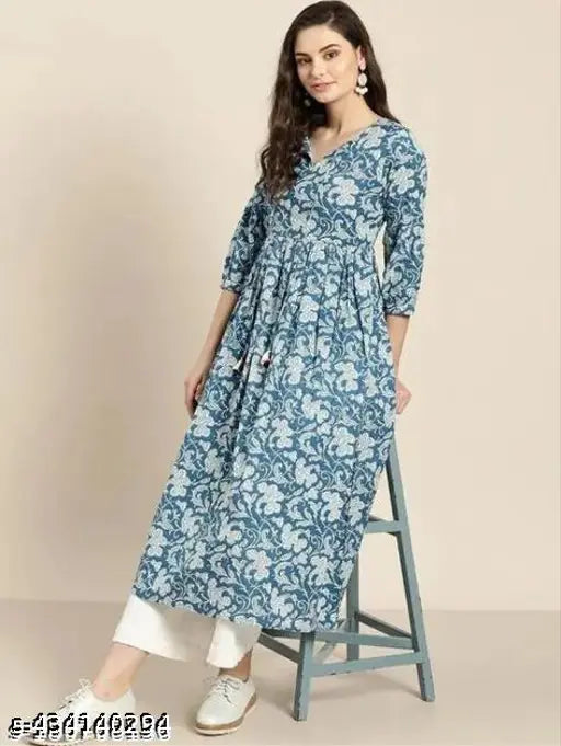 Blue patterned kurta with long sleeves and bottom wear