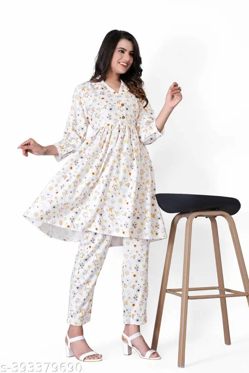 Multi-colored cotton net Rajasthani printed co-ord set for women, featuring 3/4th sleeves and a fit & flare style. Perfect for parties or summer events. Indian handcrafted