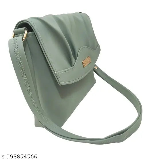 Grey leather sling bag with adjustable strap and zip closure
