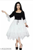 White frilly sleeveless dress with a round neck and flared skirt, below-the-knee length