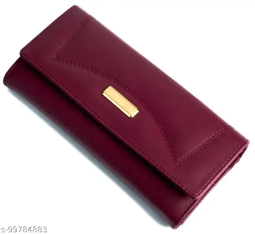 Maroon leather clutch wallet with four card slots, gold zip closure