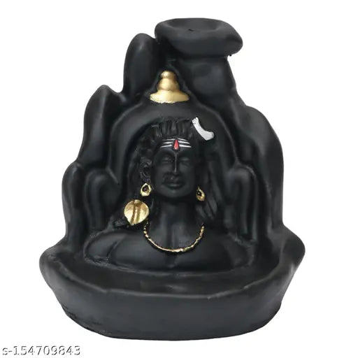 Handcrafted black poly resin Lord Adiyogi Mahadev incense holder with 101 free cones, intricately detailed with a crescent moon and tilak. A beautiful gift for home decor or spiritual practices