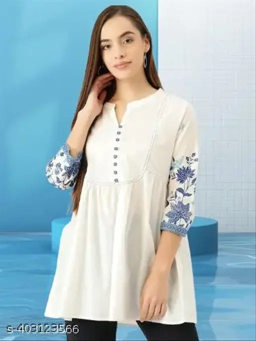 Natural Fashion white rayon embroidered net mandarin collar empire top, three-quarter sleeves on model