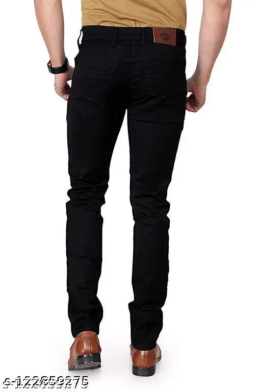 Black stretch denim jeans for men, slim fit by FLETE FASHION. Made with cotton lycra for comfort and style. Adult size 28, mid-rise, tapered leg style, full length