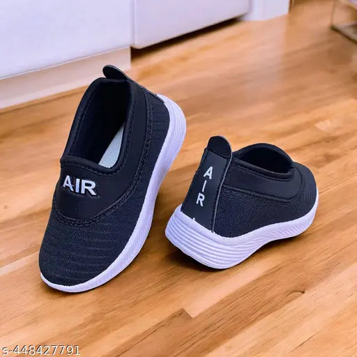 Black mesh boys casual sneakers, affordable stylish collection for versatile party wear and special occasions. Durable EVA sole ensures long-lasting wear and comfort. Lace-up fastening detail. Perfect fit for sizes: 2-2.5 years, 2.5-3 years, 2-3 years, 3-3.5 years, 3.5-4 years. Made in India