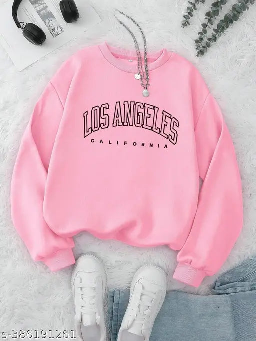 Cute polycotton sweatshirts for girls, printed with fun patterns. Size: 10-11 years. Made in India