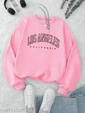 Cute polycotton sweatshirts for girls, printed with fun patterns. Size: 10-11 years. Made in India
