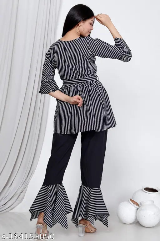 Striped cotton kurti set with umbrella cuff palazzos, three-quarter sleeves, Indian Indo-western fashion on display
