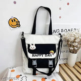 Korean-style, unisex crossbody canvas bag with large capacity and multiple pockets. Suitable for college students or casual wear. Durable design for everyday use
