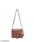 Purple leather sling bag with tassel closure, shoulder strap