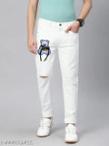 White distressed denim pants, bear graphic on knee