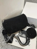 Black, studded, sling bag with coin pouch and detachable crossbody straps