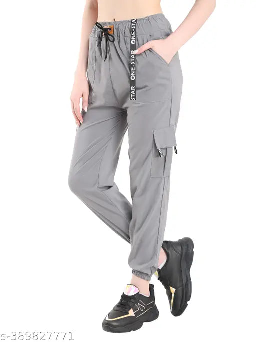 Grey cargo joggers with pockets, black trim, waist tie detail