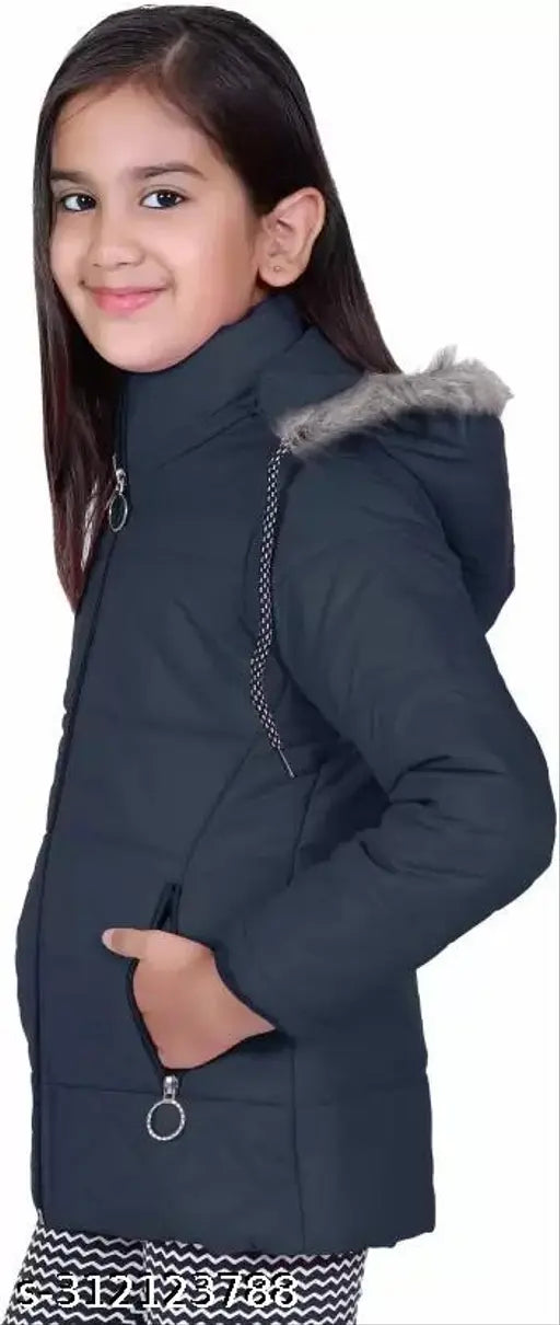 A young girl in a black jacket with a fur lining around the hood