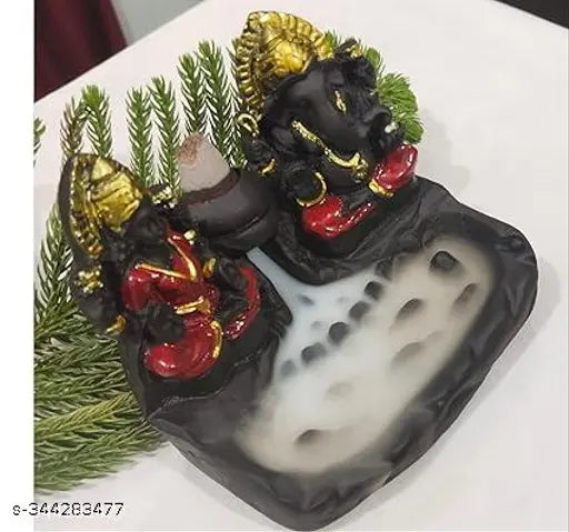 Resin Dopin Laxmi Ganesh Smoke Fountain Murti for home office Diwali Puja, with back flow incense cones. Handcrafted Indian art featuring Laxmi and Ganesh next to a smokey waterfall