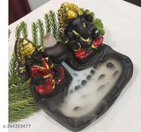 Resin Dopin Laxmi Ganesh Smoke Fountain Murti for home office Diwali Puja, with back flow incense cones. Handcrafted Indian art featuring Laxmi and Ganesh next to a smokey waterfall