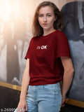 Stylish maroon cotton blend regular fit round neck T-shirt with printed net, ideal for women's summer and winter seasons. Black stitching enhances subtle styling