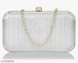 Silver sequin evening clutch with zip closure and gold chain link detail